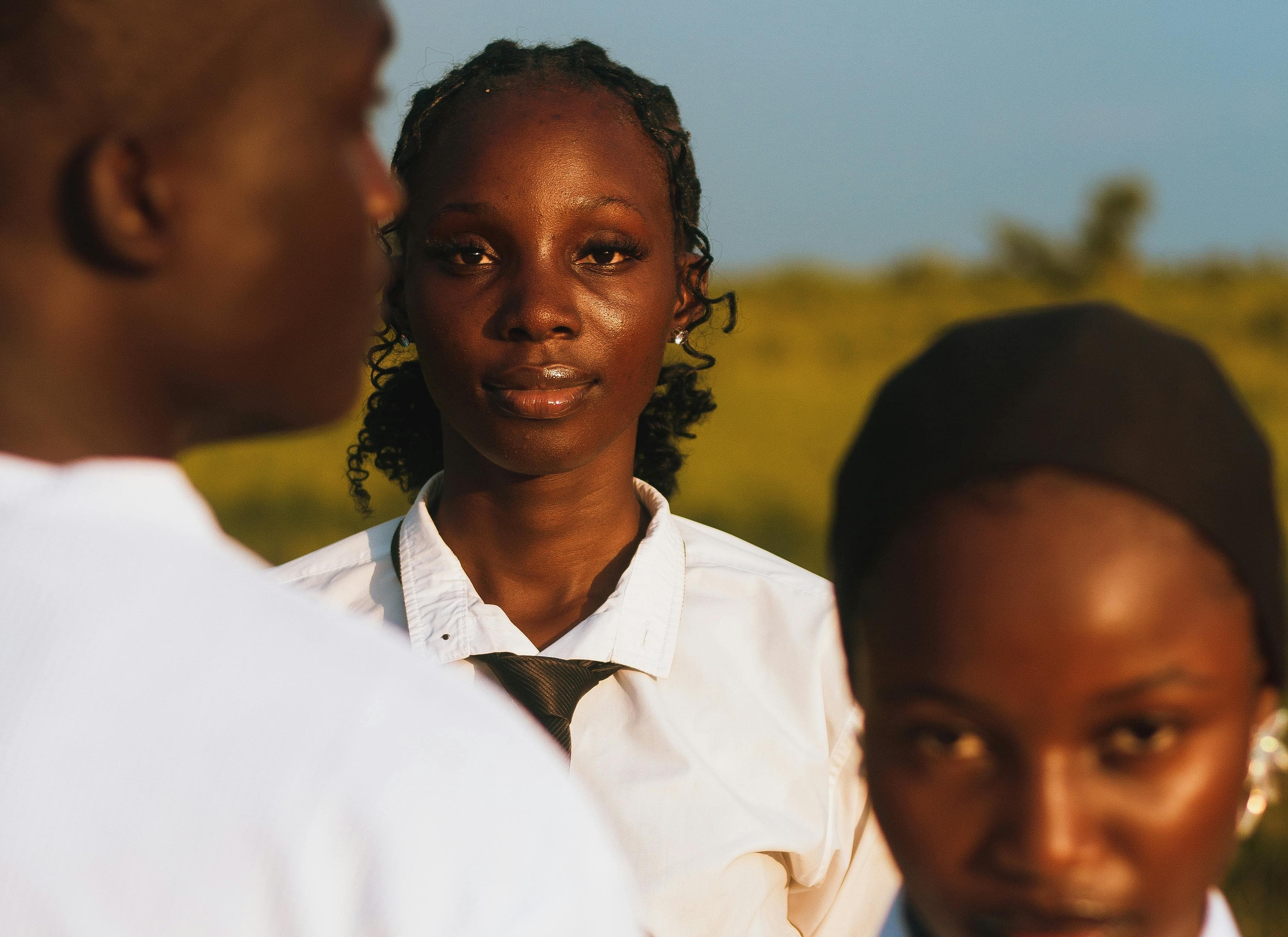 Young women sharing and reading a book together